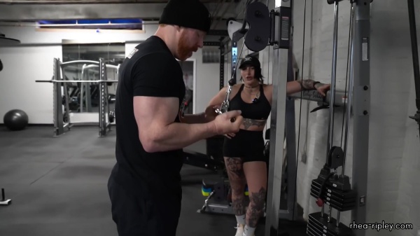 Rhea_Ripley_flexes_on_Sheamus_with_her__Nightmare__Arms_workout_4251.jpg