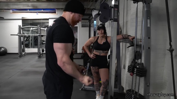 Rhea_Ripley_flexes_on_Sheamus_with_her__Nightmare__Arms_workout_4253.jpg
