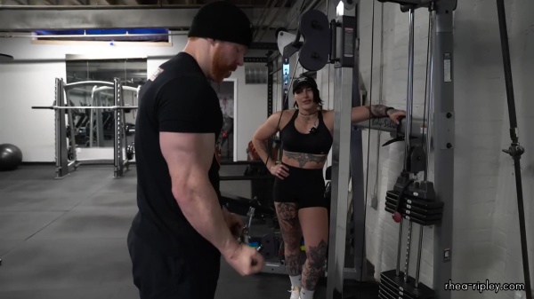 Rhea_Ripley_flexes_on_Sheamus_with_her__Nightmare__Arms_workout_4255.jpg