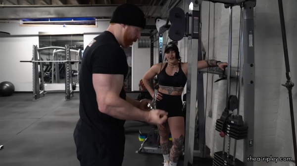 Rhea_Ripley_flexes_on_Sheamus_with_her__Nightmare__Arms_workout_4256.jpg