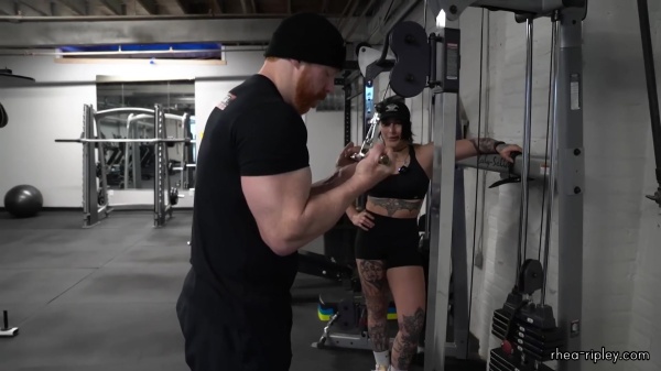 Rhea_Ripley_flexes_on_Sheamus_with_her__Nightmare__Arms_workout_4258.jpg