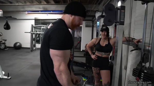 Rhea_Ripley_flexes_on_Sheamus_with_her__Nightmare__Arms_workout_4261.jpg