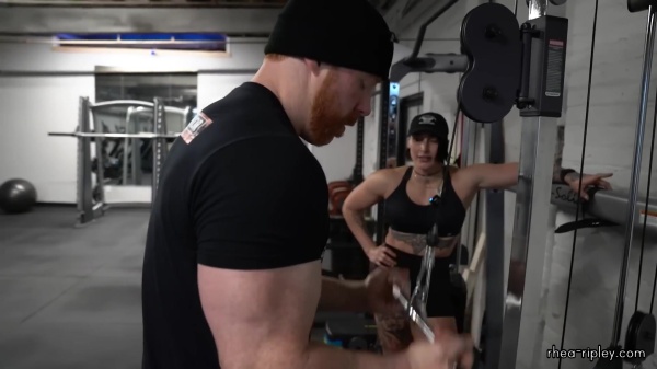 Rhea_Ripley_flexes_on_Sheamus_with_her__Nightmare__Arms_workout_4266.jpg