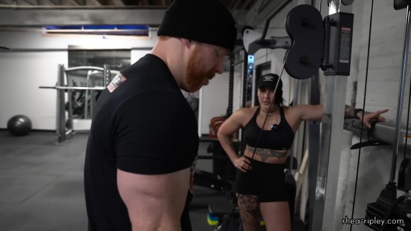 Rhea_Ripley_flexes_on_Sheamus_with_her__Nightmare__Arms_workout_4267.jpg