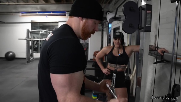 Rhea_Ripley_flexes_on_Sheamus_with_her__Nightmare__Arms_workout_4270.jpg