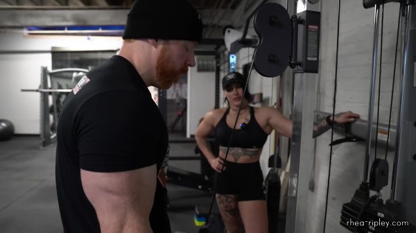 Rhea_Ripley_flexes_on_Sheamus_with_her__Nightmare__Arms_workout_4276.jpg
