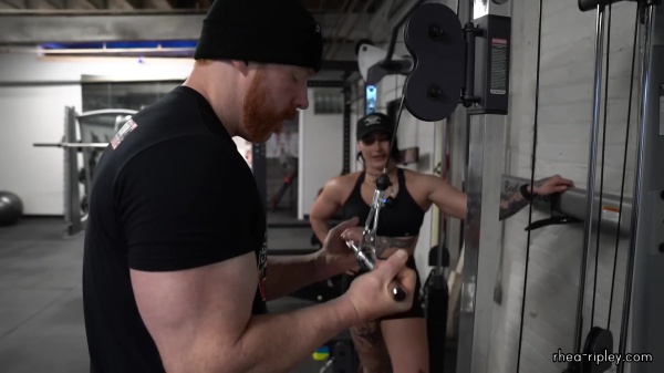 Rhea_Ripley_flexes_on_Sheamus_with_her__Nightmare__Arms_workout_4279.jpg