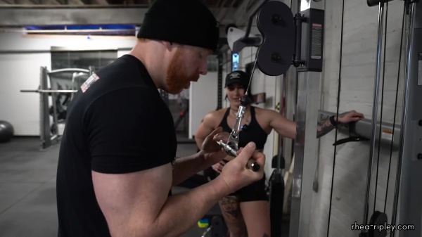 Rhea_Ripley_flexes_on_Sheamus_with_her__Nightmare__Arms_workout_4280.jpg