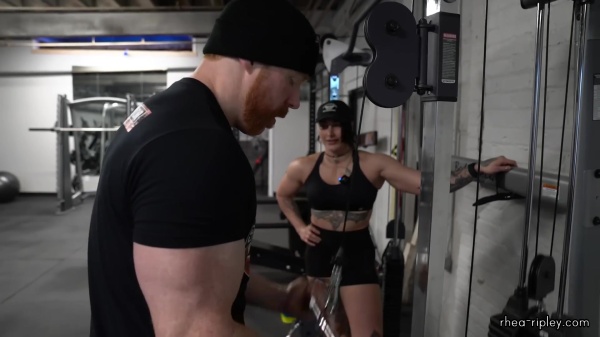 Rhea_Ripley_flexes_on_Sheamus_with_her__Nightmare__Arms_workout_4281.jpg