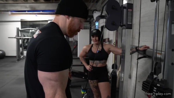 Rhea_Ripley_flexes_on_Sheamus_with_her__Nightmare__Arms_workout_4282.jpg