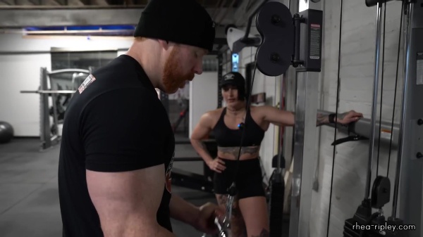 Rhea_Ripley_flexes_on_Sheamus_with_her__Nightmare__Arms_workout_4284.jpg