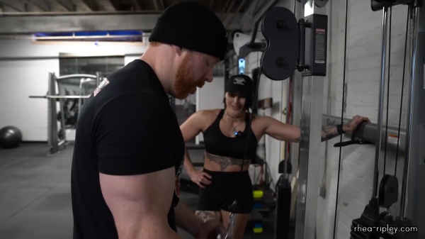 Rhea_Ripley_flexes_on_Sheamus_with_her__Nightmare__Arms_workout_4289.jpg