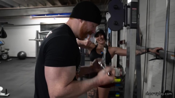 Rhea_Ripley_flexes_on_Sheamus_with_her__Nightmare__Arms_workout_4297.jpg