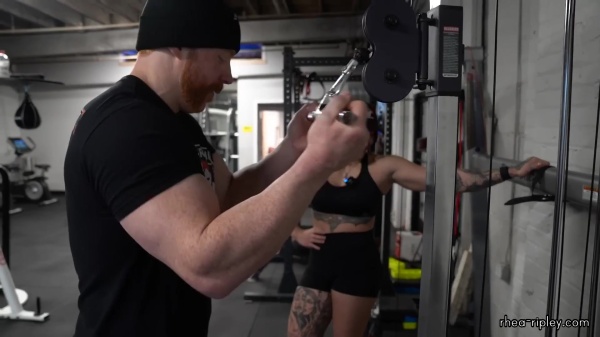 Rhea_Ripley_flexes_on_Sheamus_with_her__Nightmare__Arms_workout_4314.jpg