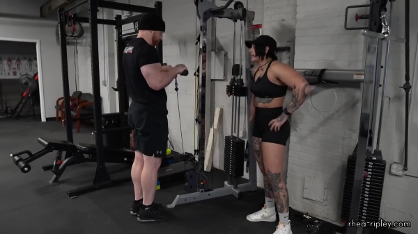 Rhea_Ripley_flexes_on_Sheamus_with_her__Nightmare__Arms_workout_4325.jpg