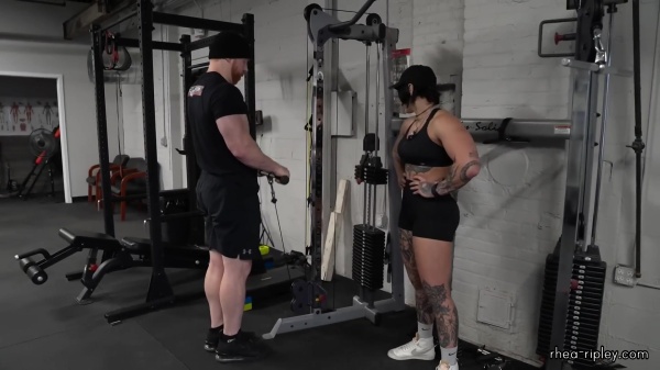 Rhea_Ripley_flexes_on_Sheamus_with_her__Nightmare__Arms_workout_4327.jpg