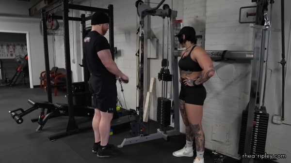 Rhea_Ripley_flexes_on_Sheamus_with_her__Nightmare__Arms_workout_4329.jpg