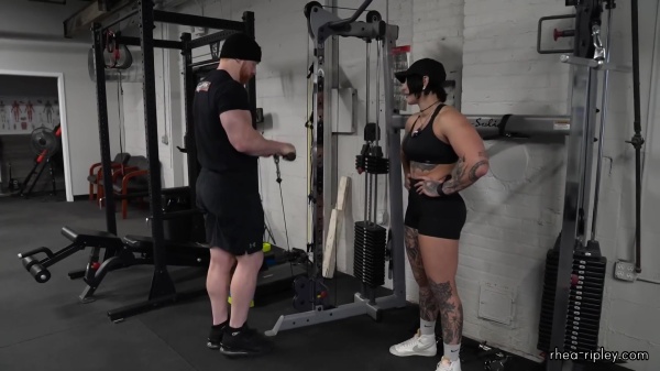 Rhea_Ripley_flexes_on_Sheamus_with_her__Nightmare__Arms_workout_4332.jpg