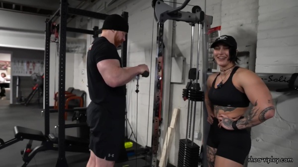 Rhea_Ripley_flexes_on_Sheamus_with_her__Nightmare__Arms_workout_4368.jpg