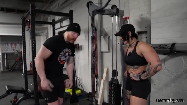 Rhea_Ripley_flexes_on_Sheamus_with_her__Nightmare__Arms_workout_4379.jpg