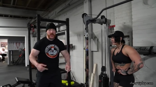 Rhea_Ripley_flexes_on_Sheamus_with_her__Nightmare__Arms_workout_4381.jpg