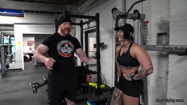 Rhea_Ripley_flexes_on_Sheamus_with_her__Nightmare__Arms_workout_4386.jpg