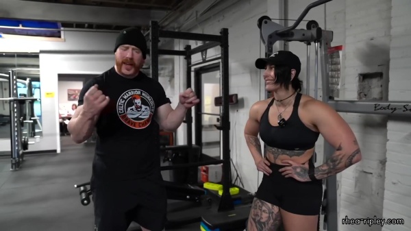 Rhea_Ripley_flexes_on_Sheamus_with_her__Nightmare__Arms_workout_4387.jpg