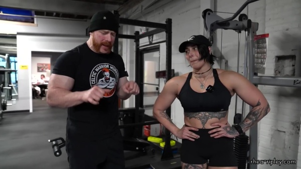 Rhea_Ripley_flexes_on_Sheamus_with_her__Nightmare__Arms_workout_4390.jpg