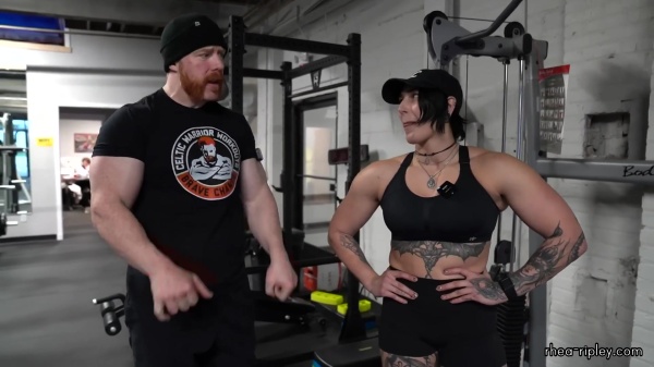 Rhea_Ripley_flexes_on_Sheamus_with_her__Nightmare__Arms_workout_4392.jpg