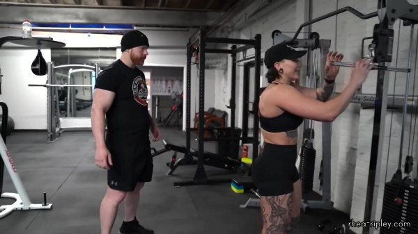 Rhea_Ripley_flexes_on_Sheamus_with_her__Nightmare__Arms_workout_4411.jpg