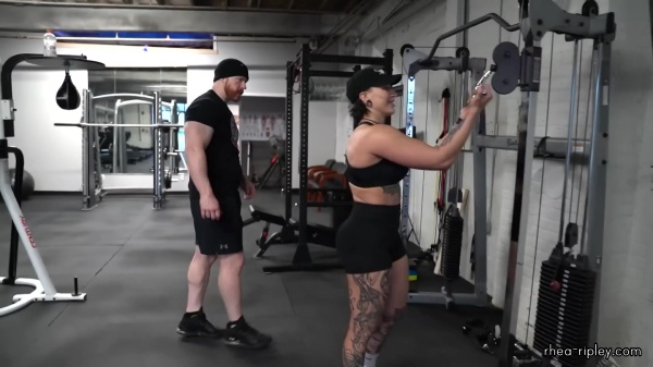Rhea_Ripley_flexes_on_Sheamus_with_her__Nightmare__Arms_workout_4413.jpg