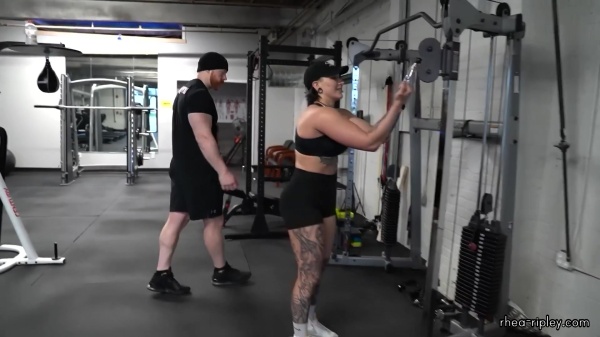 Rhea_Ripley_flexes_on_Sheamus_with_her__Nightmare__Arms_workout_4414.jpg
