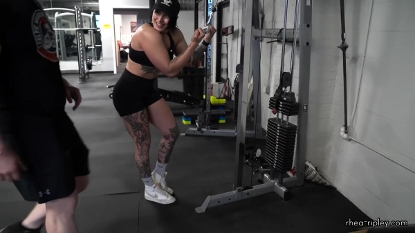 Rhea_Ripley_flexes_on_Sheamus_with_her__Nightmare__Arms_workout_4445.jpg