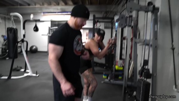 Rhea_Ripley_flexes_on_Sheamus_with_her__Nightmare__Arms_workout_4454.jpg