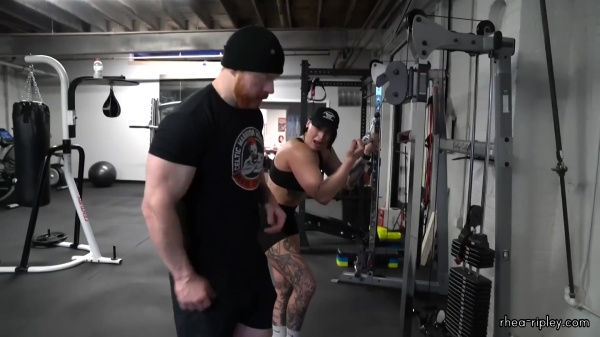 Rhea_Ripley_flexes_on_Sheamus_with_her__Nightmare__Arms_workout_4455.jpg
