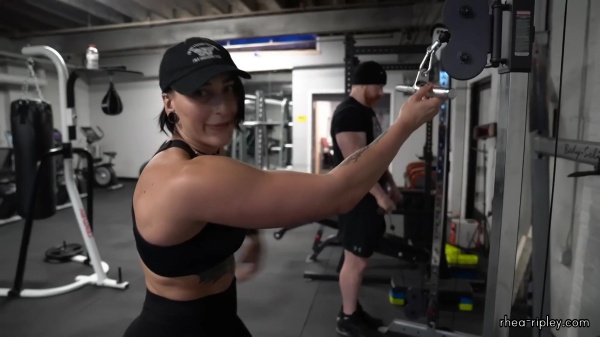 Rhea_Ripley_flexes_on_Sheamus_with_her__Nightmare__Arms_workout_4584.jpg