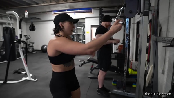 Rhea_Ripley_flexes_on_Sheamus_with_her__Nightmare__Arms_workout_4587.jpg