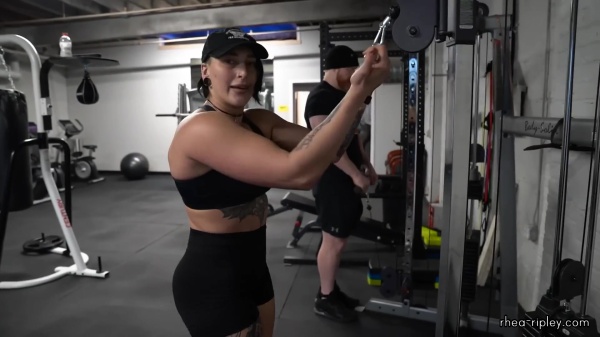 Rhea_Ripley_flexes_on_Sheamus_with_her__Nightmare__Arms_workout_4589.jpg