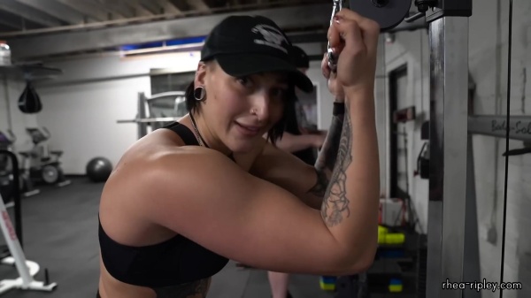 Rhea_Ripley_flexes_on_Sheamus_with_her__Nightmare__Arms_workout_4601.jpg