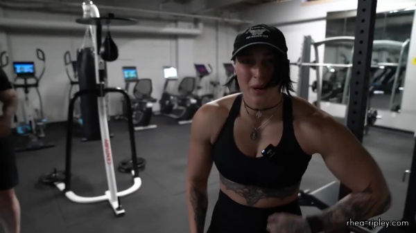 Rhea_Ripley_flexes_on_Sheamus_with_her__Nightmare__Arms_workout_4760.jpg