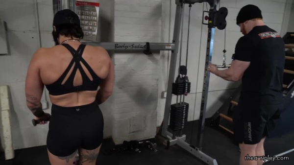 Rhea_Ripley_flexes_on_Sheamus_with_her__Nightmare__Arms_workout_4838.jpg
