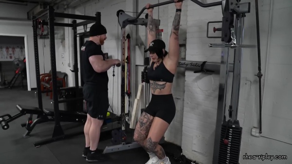 Rhea_Ripley_flexes_on_Sheamus_with_her__Nightmare__Arms_workout_4897.jpg