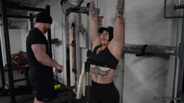 Rhea_Ripley_flexes_on_Sheamus_with_her__Nightmare__Arms_workout_4908.jpg