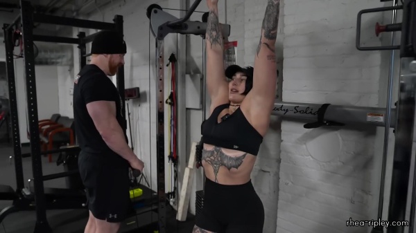 Rhea_Ripley_flexes_on_Sheamus_with_her__Nightmare__Arms_workout_4909.jpg