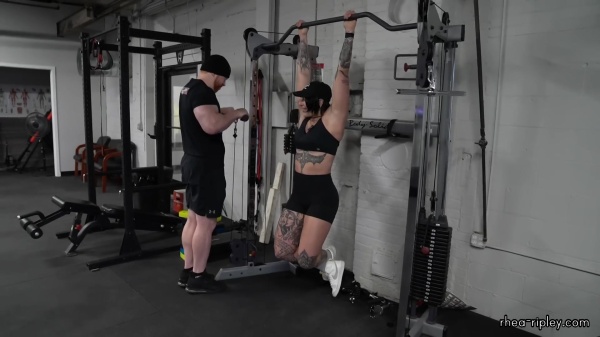 Rhea_Ripley_flexes_on_Sheamus_with_her__Nightmare__Arms_workout_4923.jpg