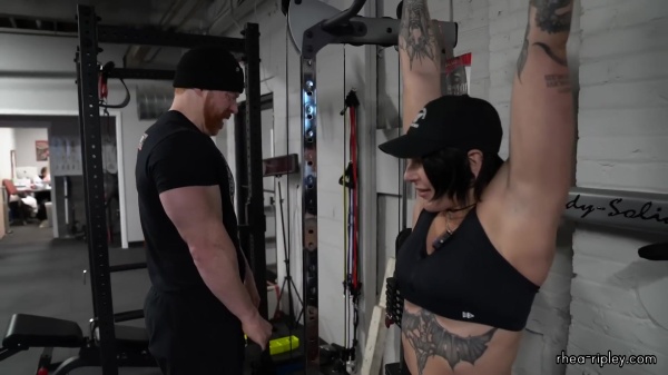 Rhea_Ripley_flexes_on_Sheamus_with_her__Nightmare__Arms_workout_4938.jpg