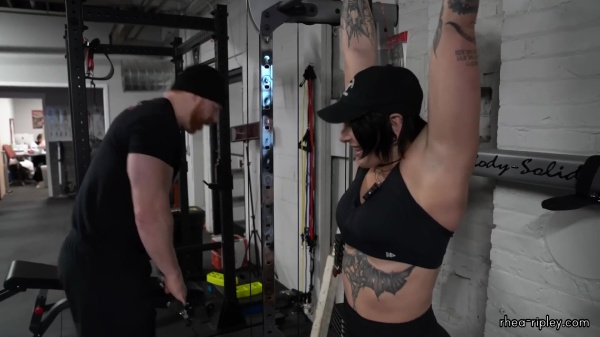 Rhea_Ripley_flexes_on_Sheamus_with_her__Nightmare__Arms_workout_4945.jpg