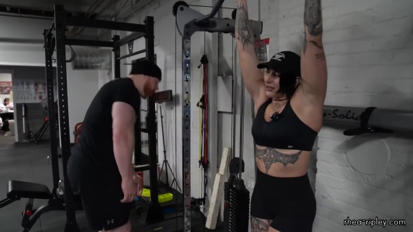 Rhea_Ripley_flexes_on_Sheamus_with_her__Nightmare__Arms_workout_4949.jpg