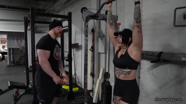Rhea_Ripley_flexes_on_Sheamus_with_her__Nightmare__Arms_workout_4950.jpg