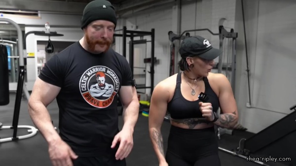 Rhea_Ripley_flexes_on_Sheamus_with_her__Nightmare__Arms_workout_4964.jpg